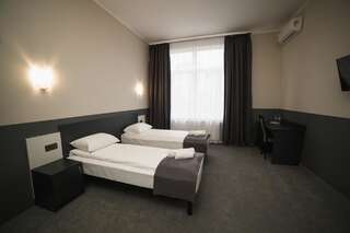 Отель GOLDEN RING Тернополь Улучшенный двухместный номер с 2 отдельными кроватями-7